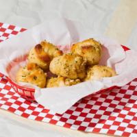 Garlic Knots · 5 pieces house baked garlic knots with side of marinara sauce.