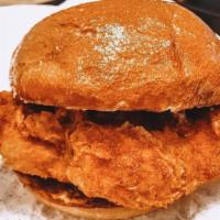 Jr. Krispy Chicken Sandwich · Toasted brioche bun, crispy chicken, cabbage tossed in secret special sauce.