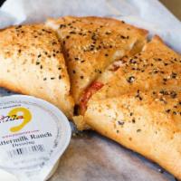 Pepperoni Pizza Rolls · Our pepperoni pizza rolls is topped with mozzarella cheese, pepperoni, pizza sauce, ranch dr...