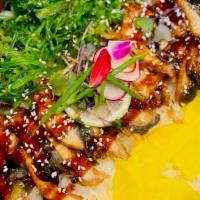 Unagi Don  · Oshinko, seaweed salad and broiled eel over rice