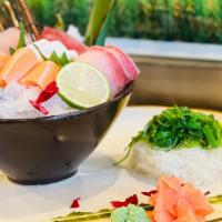 Chirashi Bowl  · Chef's choice 13pcs sashimi with Oshinko, seaweed salad over rice