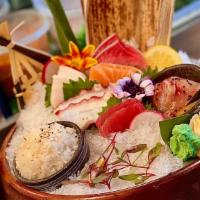 Sashimi Deluxe · Chef's choice 10pcs assorted fish served with Japanese sticky rice