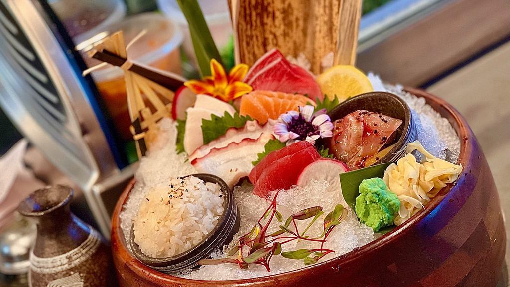 Sashimi Deluxe · Chef's choice 10pcs assorted fish served with Japanese sticky rice