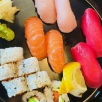 Sushi Nigiri & Roll Combo · Choice of spicy tuna or California roll with 4 pieces nigiri, and 9 pieces sashimi of chef c...