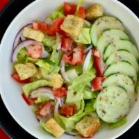 Entrée House Salad · Romaine, Cucumber, Red Onion, Roma Tomato, Croutons, Italian Dressing.