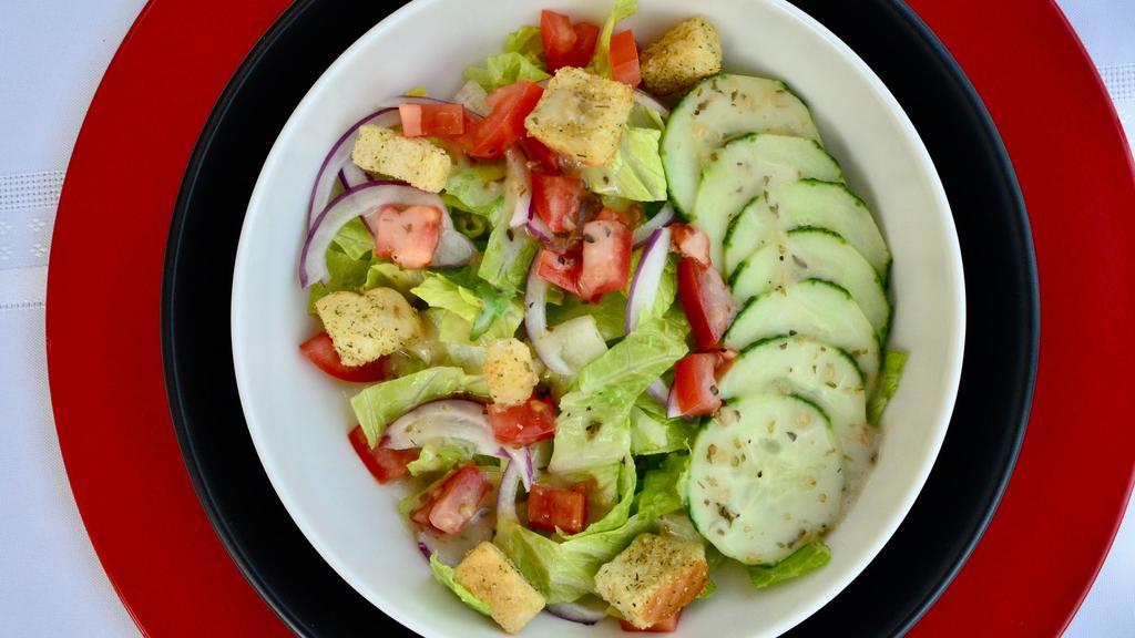 Entrée House Salad · Romaine, Cucumber, Red Onion, Roma Tomato, Croutons, Italian Dressing.
