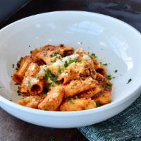 Rigatoni With Meat Sauce · Rigatoni Pasta, Grandma’s Sunday Meat Sauce made with Ground Beef, Parmesan Cheese.