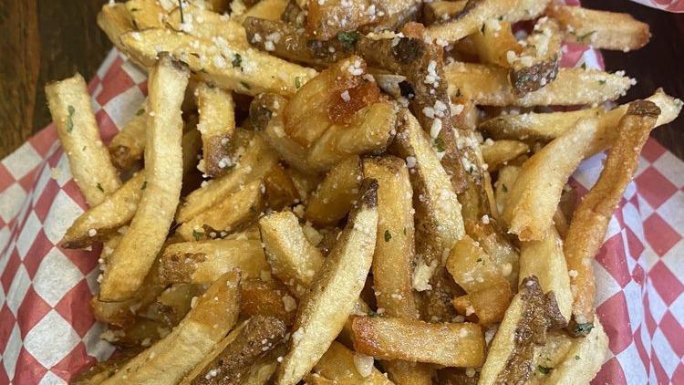 Local Cow Fries · Truffle oil, rosemary garlic and parmesan.