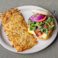 Bacon & Eggwich · 3 pieces of thick cut bacon, 2 scrambled eggs, Swiss cheese, tomato, red onion & arugula on ...