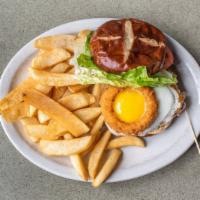 Blue Collar Burger · Cheddar cheese, thick cut bacon, a sunny side up egg, lettuce, tomato, a fried onion ring, p...