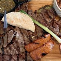 *Carne Asada · Best carne asada in the US! Seasoned perfectly and served with grilled cactus, grilled onion...