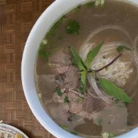 Pho Tai Nam Gau · Beef, flank, and brisket. Rice noodle soup with slice beef, flank, and brisket.