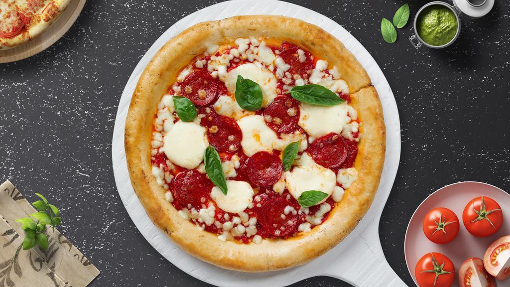 Pepperoni Planet Pizza · Authentic Neapolitan-style pizza topped with San Marzano tomato sauce, a blend of italian cheeses, and pepperoni.