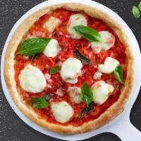 The Queen Pizza · Take a bite of our authentic Neapolitan-style pizza topped with olive oil, basil, mozzarella...