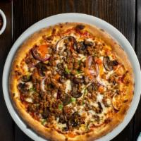 Meet The Vegan Meats Club · Our famous vegan meat pizza is topped on our homemade pizza with vegan cheese, vegan sausage...