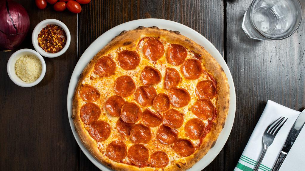 The Vegan And Gluten Free Pepperoni Club · This vegan and gluten free pizza has vegan pepperoni on top of a cauliflower crust made with vegan cheese and homemade tomato sauce.