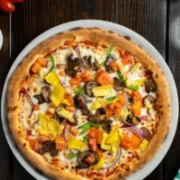 The Vegan And Gluten Free Veggies Club · Our vegan and gluten free pizza topped with delicious and healthy vegetables atop a cauliflo...