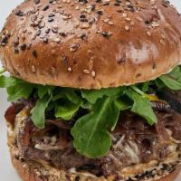 100% Grass-Fed Umami Burger* · mushroom, caramelized onion, arugula, parmesan, mayonnaise, flaxseed bun, umami sauce .