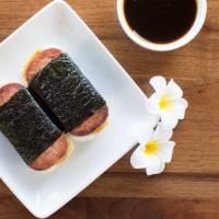 Spam Musubi · Rice and spam with nori and sweet sauce.