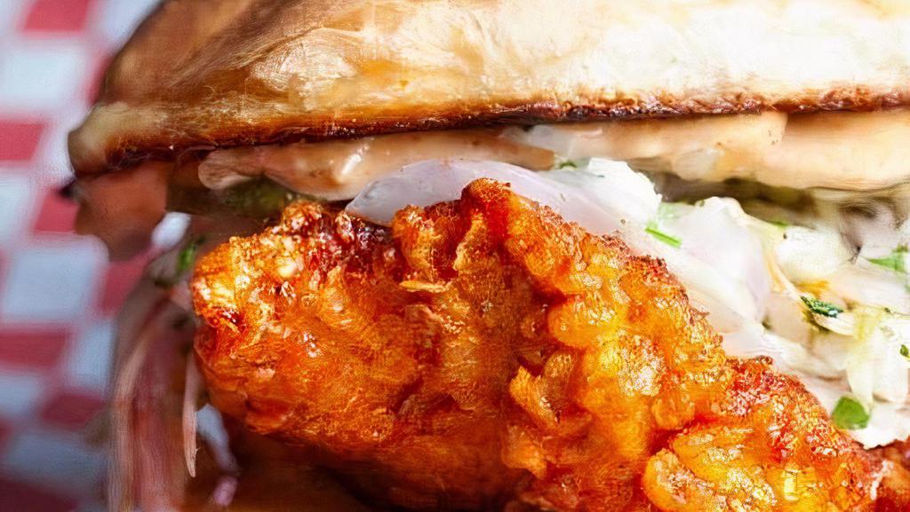 Hot Chick Sandwich To Go · buttermilk fried chicken, pickles, house slaw, tomato, pepper jack, on a brioche roll