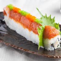 Dragon Roll · Crab and avocado topped with shrimp, spicy tuna, Ebi, and tobiko.