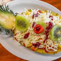 Ensalada Frutas · Tropical fruit salad with pieces of pineapple, banana, papaya, grapes, blackberries and melo...