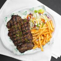 Carne Asada · Grilled steak. Served with rice and red beans.
