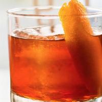 Old Fashioned · Bourbon, simple, Angostura and House Orange-Cardamom Bitters, Orange Peel.