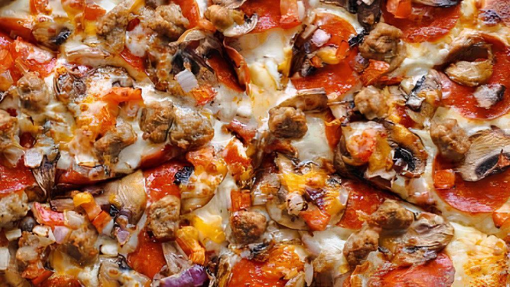 Magnificent Greek Pizza · Spinach, fresh mushrooms, kalamata olives, artichoke hearts and feta cheese.