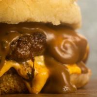 Gravy Cheese Burger · Double smash burger patties topped with cheese and greens then smothered in Kealoha's signat...