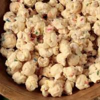 Nibblers Birthday Cake Popcorn · Because every day is someone's birthday...  We drench our vanilla candied popcorn in rich wh...