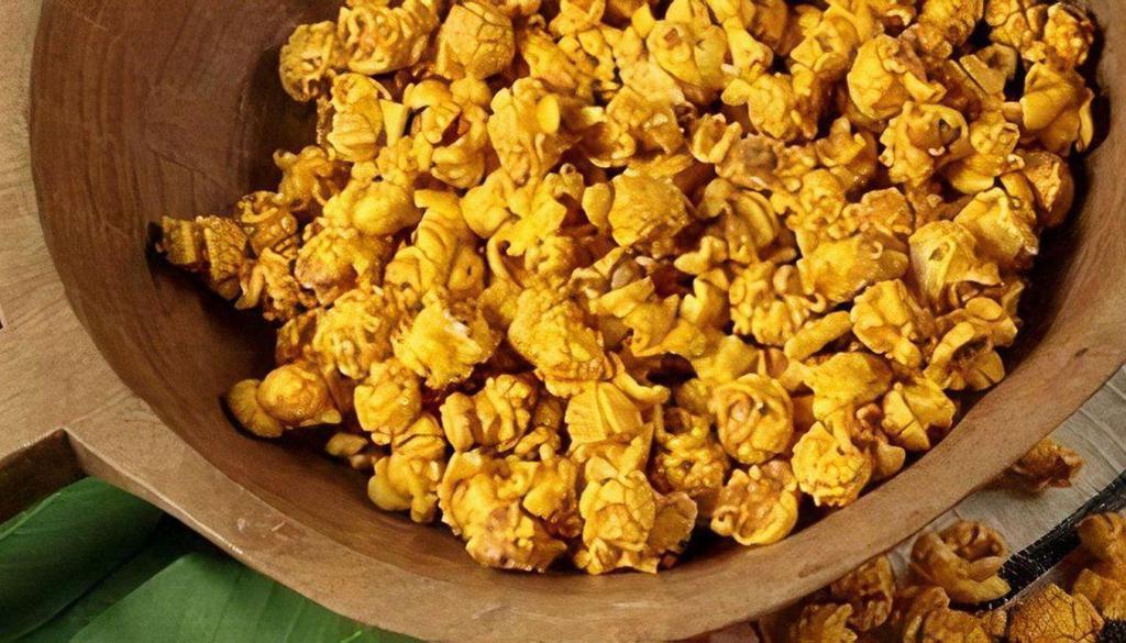 Nibblers Bacon Cheddar Popcorn · Bacon lovers unite!  Smoky bacon seasoning is perfectly blended with the zing of real cheddar cheese and then topped off with a sprinkle of bacon bits for an intense flavor you won't forget.