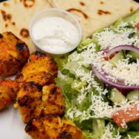 Chicken Kebab Salad · Lettuce with grilled chicken, tomatoes, onions, feta cheese, cucumbers, greek olives, and ho...