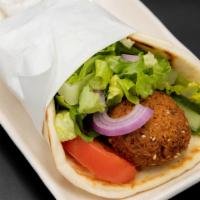 Falafel Sandwich · With falafel (chickpea patties w/ parsley, onions & spices), lettuce, tomato, onion and tzat...