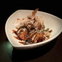 Takoyaki · deep fried octopus dumplings (5pcs).