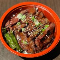 Kalbi Donburi · grilled garlic-soy marinated boneless beef short rib over rice.