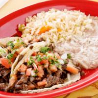 Asada Taco · Grilled steak. Served with rice and beans. Garnished with pico de gallo. Order for two.