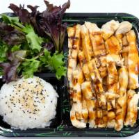Teriyaki Solo · Contains gluten. Teriyaki chicken, steamed rice and a spring mix salad.