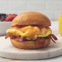 Bacon, Egg, And Cheese · Made from scratch with applewood smoked bacon, scrambled eggs, and cheddar cheese on a brioc...