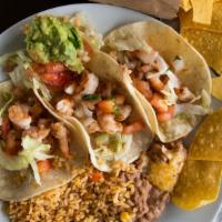 Shrimp Soft Tacos · Shrimp cooked with pico de gallo. Served with rice and beans pico and guacamole.