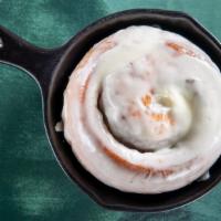 Large Café Fresh Cinnamon Roll · Homemade and served with cream cheese frosting.