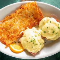 Eggs Benedict · Traditional eggs benedict, served with hash browns or home fries.