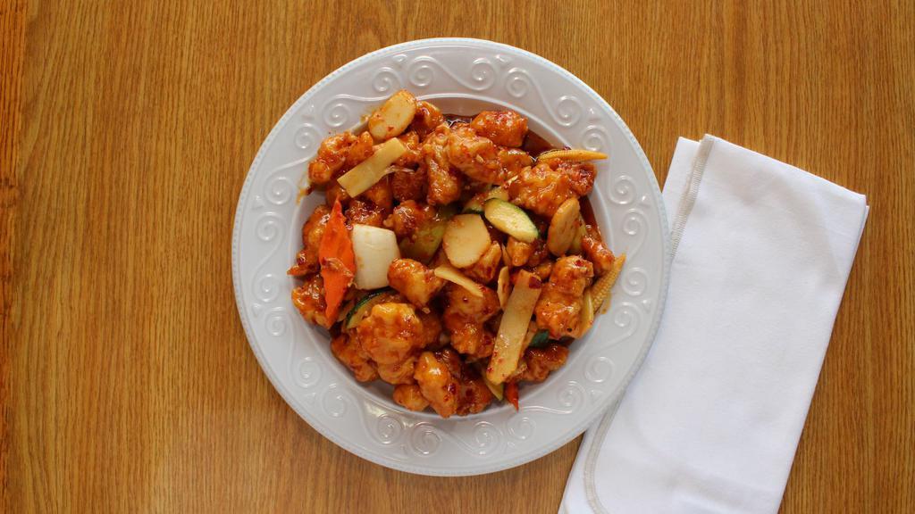 General Tso'S Chicken · Hot and spicy. Fried golden brown chicken tossed with assorted vegetables in hot general tso's sauce.