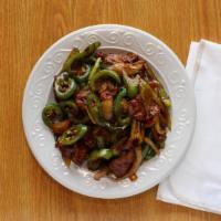 Jalapeño Steak · Stir-fried jalapeño and bell peppers, red onions, scallions, asparagus, and beef slices.