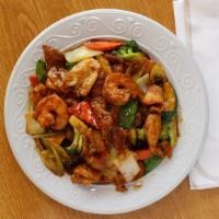 Happy Family · Shrimp, beef, and chicken stir-fried with vegetables in brown sauce.