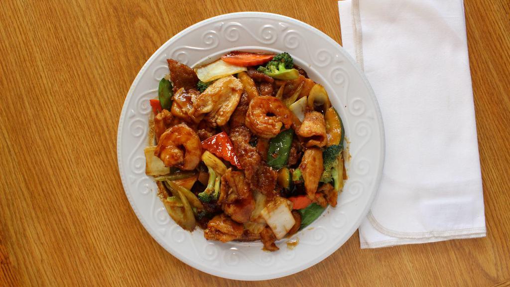 Happy Family · Shrimp, beef, and chicken stir-fried with vegetables in brown sauce.