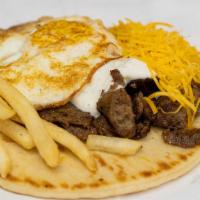Sunny Side Gyro · Gyro meat toped with a sunny side egg, fries, cheddar cheese, and TZ sauce.