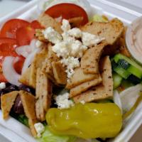 Chicken Gyro Salad · Chicken Gyro meat on-top of romaine lettuce. Includes feta, cucumber, tomato, onions, greek ...