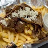 Classic Gyro Fries · Gyro meat and feta over fries. Includes one cup of tzatziki sauce.