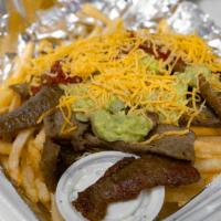 California Gyro Fries · Gyro meat topped with guacamole, cheddar cheese, a side of red hot sauce, and a side of tzat...